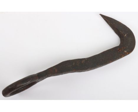 Excavated Grappling Hook, relic grappling hook with large circular end. Used to scale the walls of the defences. This item wa