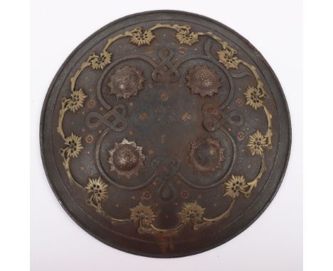 Indian Iron Shield Dhal, Late 19th&nbsp;Century,&nbsp;reinforced edge, applied with brass flowering stems around the border a