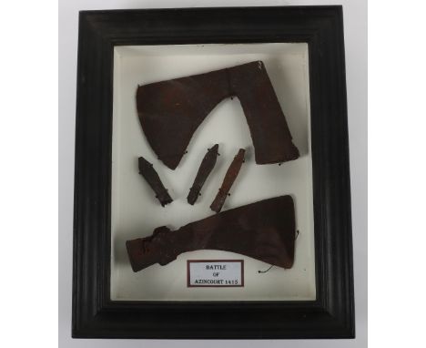 Framed Display of Relics Reputed to have Come from the Battlefield at Agincourt (Azincourt), being two relic axe heads and th