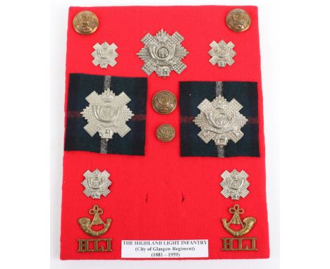 Highland Light Infantry Badge Grouping, consisting of various types of cap / glengarry badge, tunic buttons, shoulder titles 