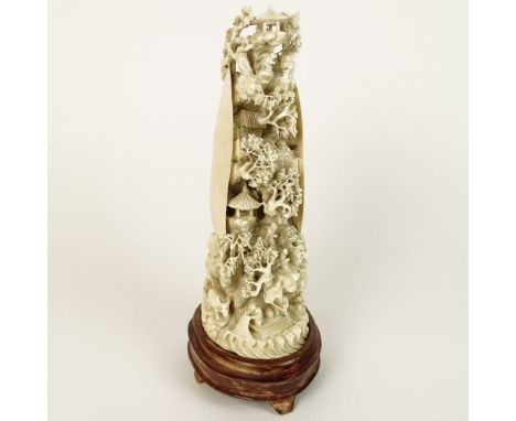 Chinese Carved Ivory on wood base, Clam Shell with Mountain Village. Unsigned. Good condition. Measures 8-1/4" H, 3-1/2" W (a