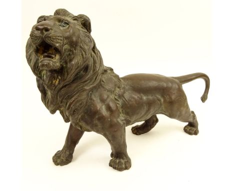 Japanese Meiji Period Bronze Lion. Signed on bottom with character marks. Brown Green Patina. Measures 12-1/2" x 18" L. Shipp