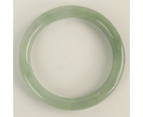 Chinese Translucent Jade Bangle. Unsigned. Good condition. Measures 5/8" W, interior diameter 2-1/4".  Shipping $30.00 