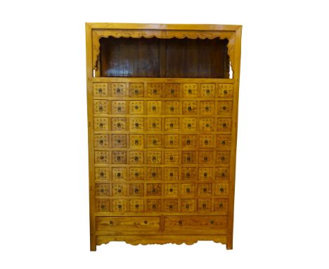 Modern Chinese Carved Hard Wood Apothecary Chest. Hand Carved. 66 Drawers with Chinese Character Markings Brass Ring Pulls. U