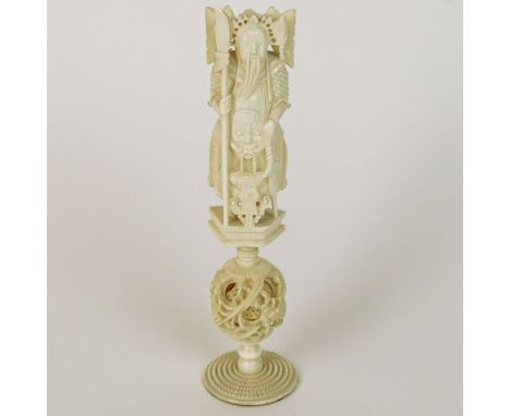 Chinese two part Ivory Carving, Warrior figure and Mystery Ball Base. Unsigned. Good condition Measures 8-3/4" H, 2-1/8" W. T