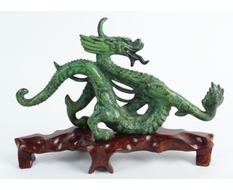 Chinese Archaistic Bronze Dragon Figure on Fitted Wooden Stand. Very Good Condition. Measures 5-1/2 Inches Tall 9-1/2 Inches 