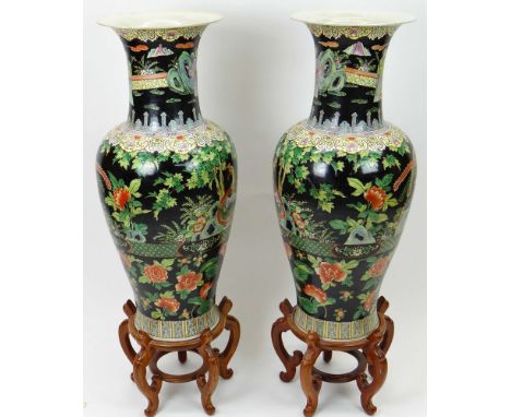 Large Pair of Chinese Famille Noir Baluster Vases with Wood Stands. Apocryphal Qianlong Mark to Base. Good Condition or Bette