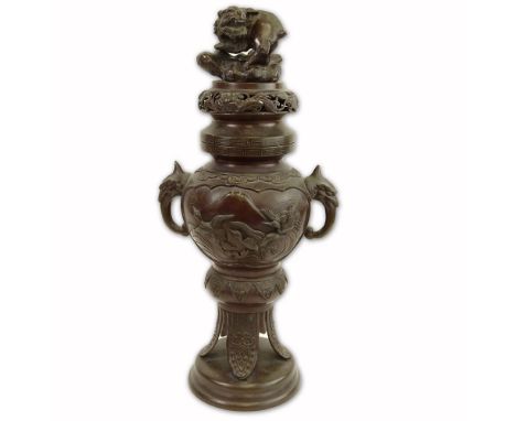 20th Century Japanese Bronze Censer. Unsigned. Damage to finial otherwise good condition. Measures 19-1/2" H, 8-1/2" W. Shipp