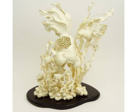 Large Chinese Carved Ivory Group with wood base, Aquatic Scene. Unsigned. Good condition. Measures 15" H, 13" W. This item wi