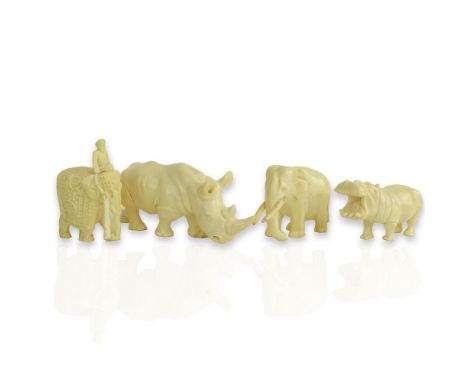 Collection of Four (4) Carved Ivory Animal Figures. Includes, 2 elephants, rhinoceros, hippopotamus. Rhino and hippo are sign