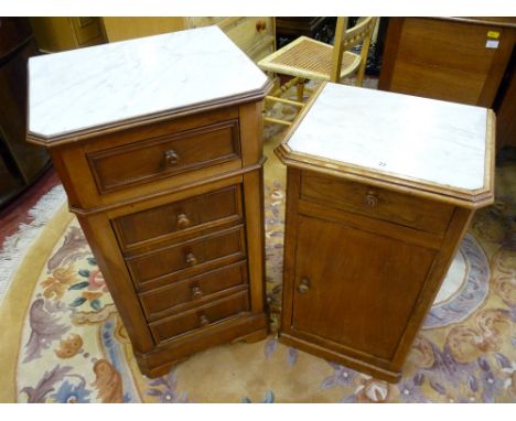 TWO FRENCH WALNUT VINTAGE POT CUPBOARDS with white marble inset tops, 82.5 cms high the tallest