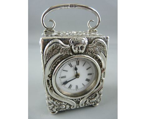 A SILVER CASED MINUET CARRIAGE CLOCK, London 1901, maker's mark 'C D', French brass movement with captive winder, the case ba