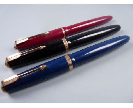 Vintage red Parker Slimfold fountain pen with original 14ct gold nib and gold plated trim, two Vintage Parker Duofold Standar