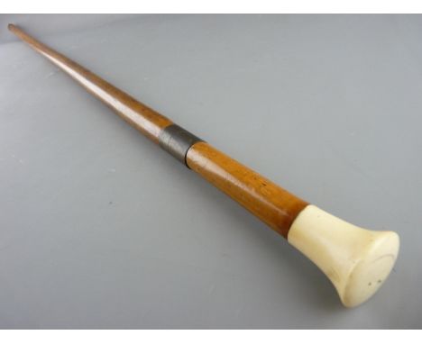 A MALACCA SWORDSTICK with ivory/bone grip and brass mounts, 50 cms long, the near square blade, 93 cms long complete