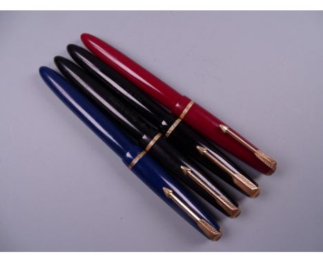 Four Vintage Parker Slimfold fountain pens (two black, one blue, one red), all with 14k nibs