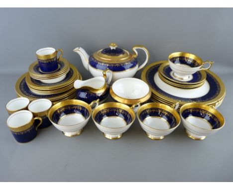 THIRTY FIVE PIECES OF AYNSLEY 'GEORGIAN COBALT' TABLEWARE to include a lidded teapot, milk jug and sugar bowl, four coffee ca