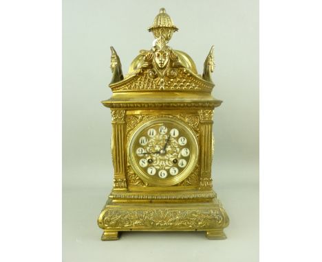 A GILT BRASS FRENCH MANTEL CLOCK with Japy Freres movement, 37.5 cms high, 20 cms wide
