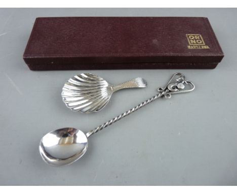 A SILVER CADDY SPOON with scallop shell bowl and bright cut tapered handle by George Burrows, probably London 1789 and a Cont