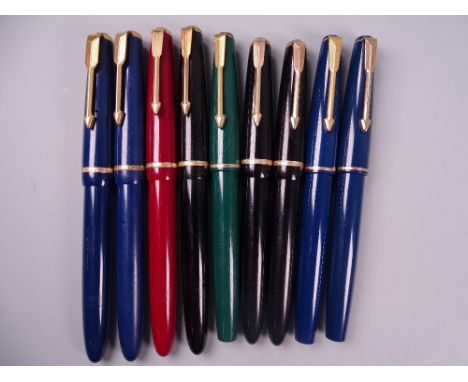 Four Vintage Parker Slimfold fountain pens (one black, two blue, one red), black cap damaged, all with 14k nibs, two Vintage 