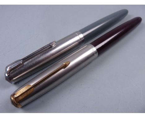 Vintage burgundy Parker 51 fountain pen with Lustraloy cap and jewel and gold filled clip and a Vintage navy grey Parker 51 f