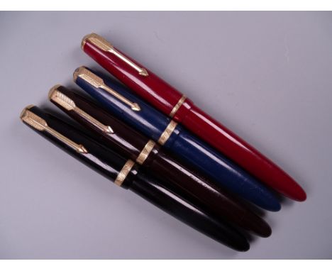 Four Vintage Parker Duofold fountain pens (black, blue brown red), all with 14k nibs