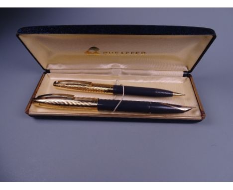 Vintage Grey Sheaffer Imperial VIII Touchdown fountain pen and pencil set, both with gold plated caps in original box. Engrav