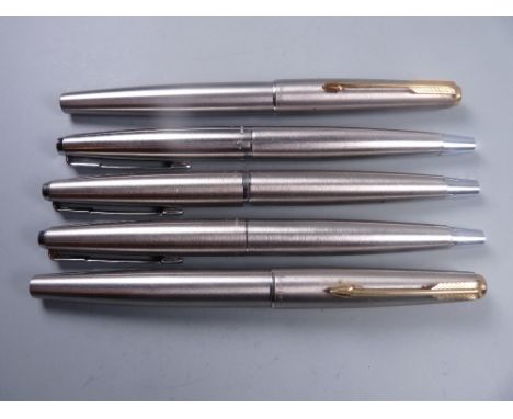 Vintage stainless steel Parker 65 Flighter DeLuxe fountain pen with gold plated trim and broad nib, a vintage stainless steel