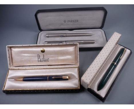 Vintage green Parker Slimfold fountain pen with gold plated trim and chalk marks, in original box, a Vintage blue Parker Duof