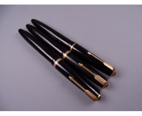 Three Vintage Black Parker Duofold fountain pens including one Maxima, all with 14k nibs