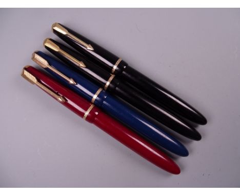 Four Vintage Parker Slimfold fountain pens (two black, one blue, one red), all with 14k nibs