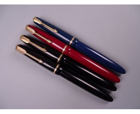 Four Vintage Parker Slimfold fountain pens (two black, one blue, one red), all with 14k nibs