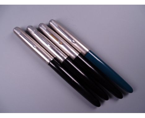 Four Vintage Parker 51 fountain pens (three black, one green)