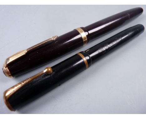 Vintage black Parker Moderne fountain pen with gold plated trim and 14ct gold nib, the barrel engraved 'A Rowntree' and a Vin