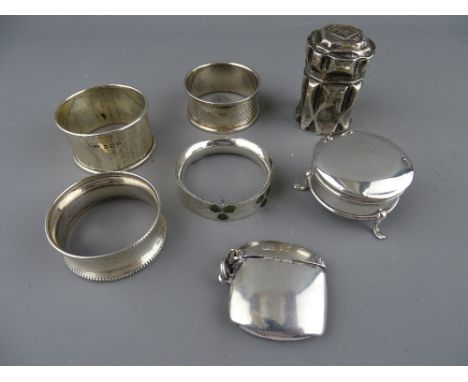 SEVEN ITEMS OF SMALL SILVER to include a Dutch peppermint box, vesta case, three footed lidded trinket box and four napkin ri