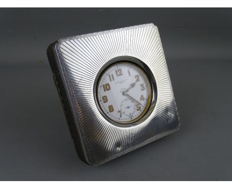 A SILVER FRONTED TRAVELLING WATCH CASE, Birmingham 1919 containing a Brevet Goliath 33236 chrome cased pocket watch with manu