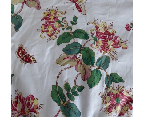 A pair of chinz curtains edged with green braid, pencil pleat heading, thermal and blackout lining under white lining materia