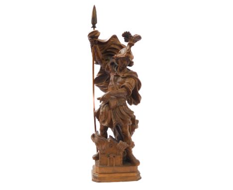 A well-defined carved softwood Italianate&nbsp;figure of St. Florian with plumed helmet and holding a pail of water above a m
