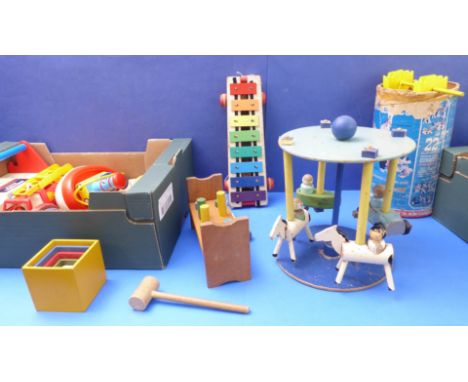 Wooden early learning toys to include an early carved horse and cart, a 1930s set of Minibrix, a vintage roundabout; Fisher-P