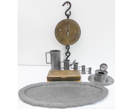 A selection of mostly pewter: a graduated set of five 19th century pewter measures, a pewter fish platter, a 19th century pew