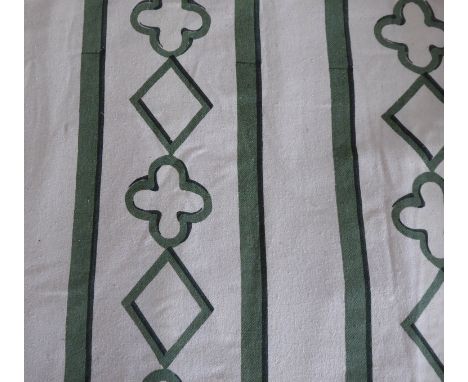 A pair of green and cream curtains edged with olive green tape, triple pinch pleat heading, thermal lining under white lining
