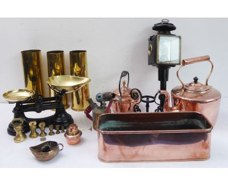 A good selection of antique copper and brassware to include three WWI brass shell cases (29cm high), copper range kettles, an