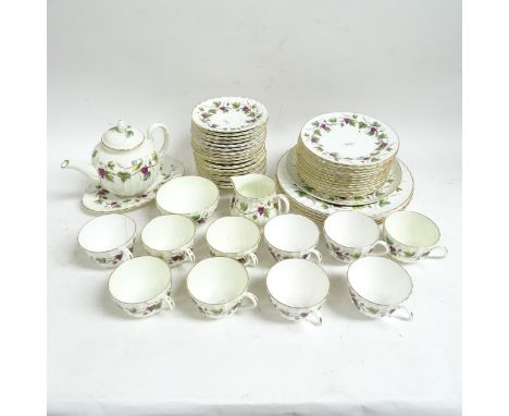 Royal Worcester Bacchanal tea service for 10 people, including teapot, and matching dinner plates