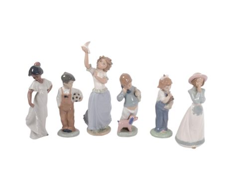 A group of 6 NAO figures, including figure "Wanna Play" ref no. 1068, and model ref. 1044 boy on phone with puppets?, etc (6)