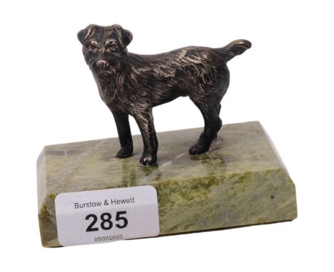 A George V marble deskstand, surmounted by a silver Border Terrier, W10cm 