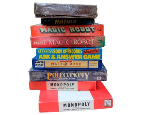 Various Vintage games and puzzles, including magic robot