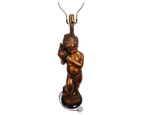 A heavy composition table lamp, modelled as a gilded cherub holding a shell, height to top of head 60cm 