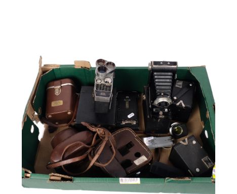 A quantity of Vintage cameras, including a Bell & Howell Sportster IV, a Kodak Brownie 6-20 camera model D, a Kodak 6-20 fold