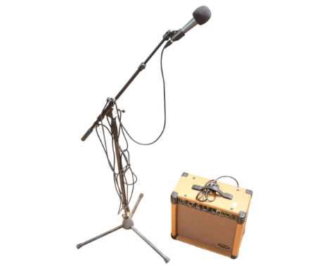 A Shure Beta 58A microphone, with an on-stage tripod stand, together with a Stagg 40 watt amplifier 
