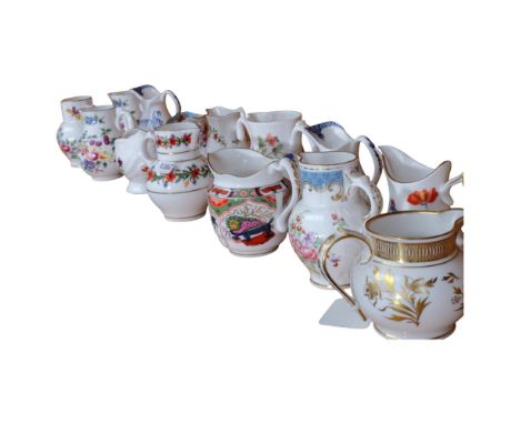 A collection of 14 Royal Worcester miniature porcelain jugs, tallest 8.5cm being the poppy jug 