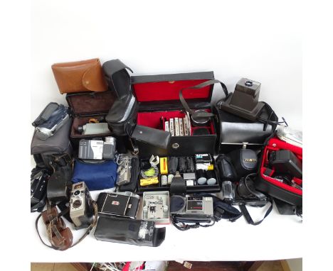 A quantity of mixed cameras and equipment, including a Minolta zoom 35-88mm lens, a Minolta 80-200mm zoom lens, a Polaroid Su